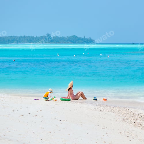 Preview: Three Year Old Toddler Boy On Beach With Mother. Summer Family Vacation At Maldives.