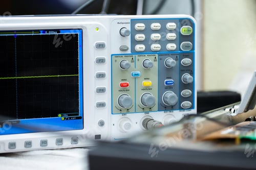 Preview: An electrician measures the voltage while repairing an LSD TV in a service center.