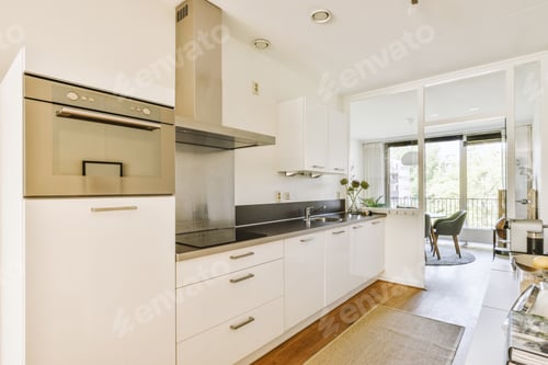 Preview: Interior of modern kitchen with white furniture