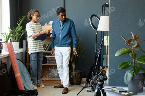 Preview: Teenage Boy Directing Art Project in School