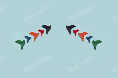 Preview: banner two groups five paper origami pigeons black, red, orange, blue, green fly on light background