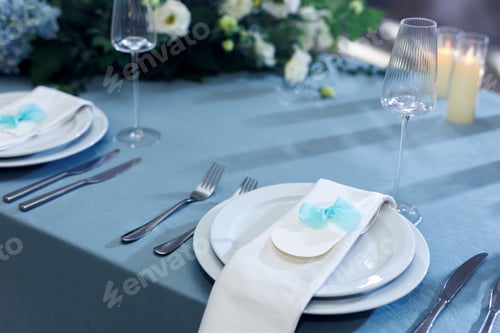 Preview: Elegant table setting with an empty menu card for a wedding or special event.