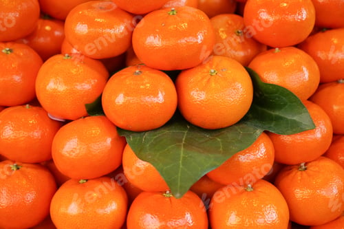 Preview: close up of slice of orange fruits in a bowl
