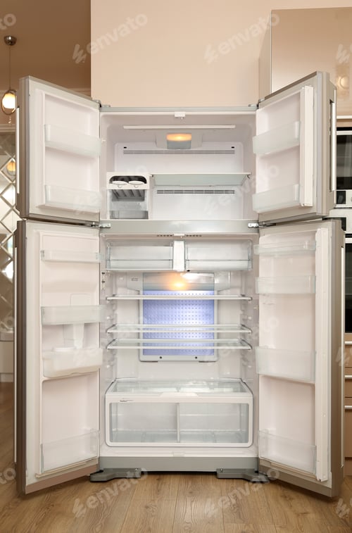 Preview: Empty modern refrigerator with open doors in kitchen