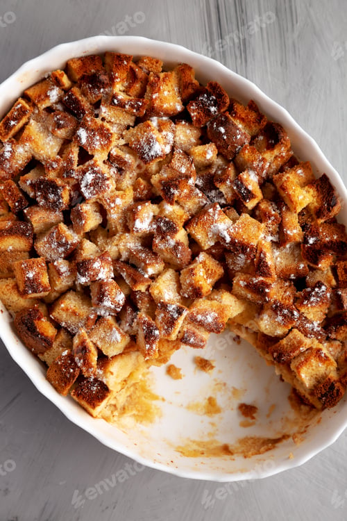 Preview: Homemade Bread Pudding in a Dish, top view. Flat lay, overhead, from above.