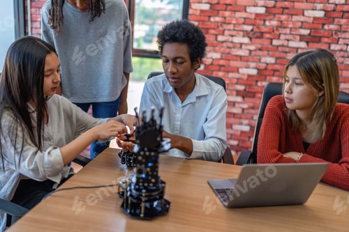 Preview: Teenager children learning with new innovation robotic hand interface hand control in classroom