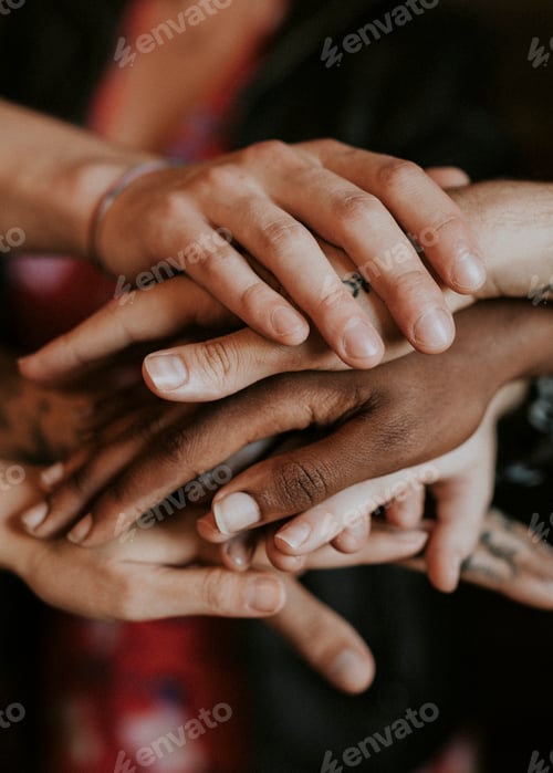 Preview: Creative team stacking their hands