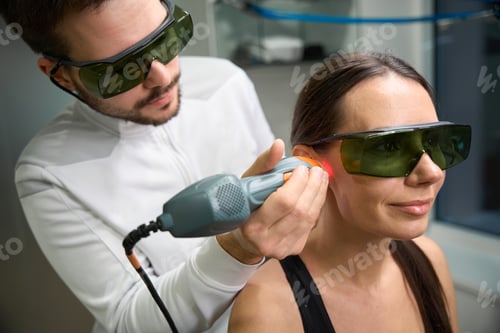 Preview: Client on treatment with ultrasound machine in clinic