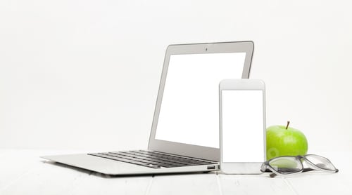 Preview: Workplace with laptop, smartphone, supplies