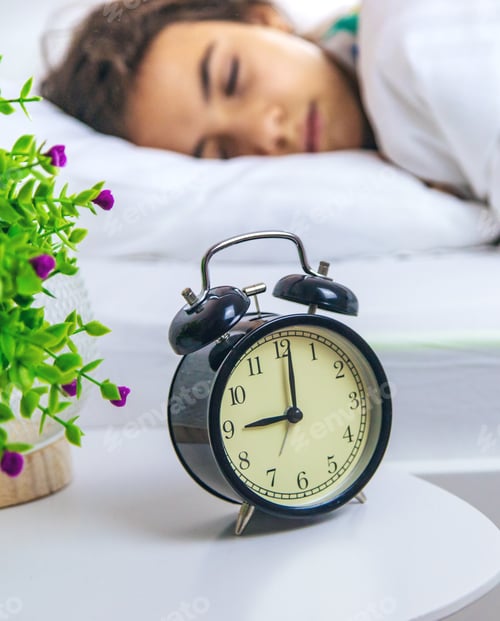 Preview: The child sleeps in the morning in bed. Selective focus.