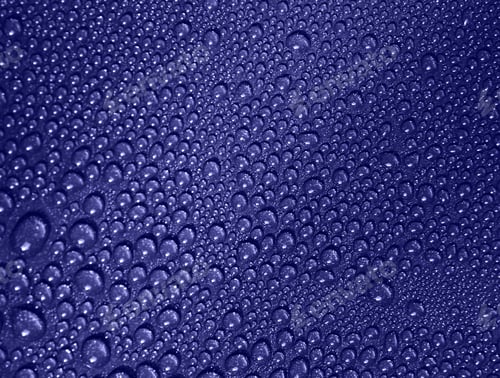Preview: Water drops on a metallic background. Close up. Color of 2022 year, very peri, toned