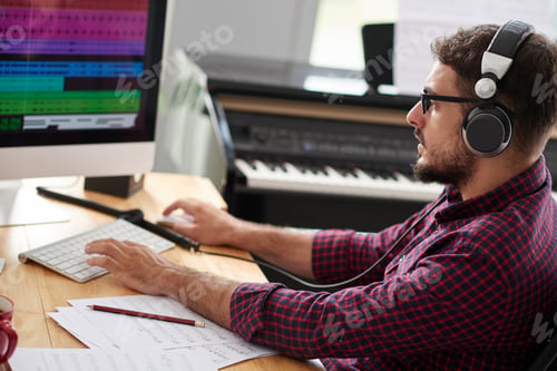 Preview: Composer listening to new song