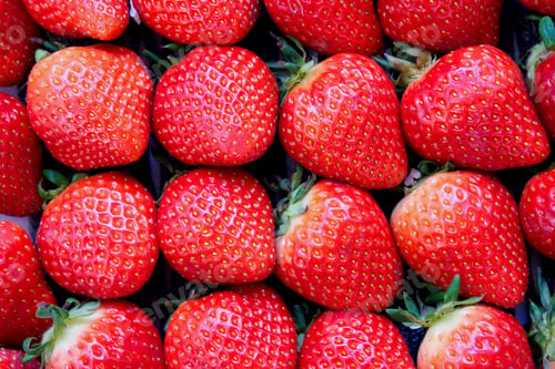 Preview: Close up view of dozen of fresh red strawberries.