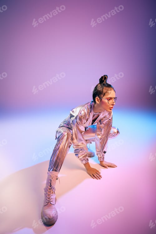 Preview: Stylish woman showcases vibrant holographic attire in a futuristic urban setting