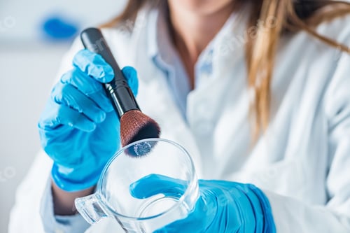 Preview: Forensic scientist in a lab, looking for fingerprints