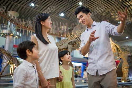 Preview: Young family in museum of natural history