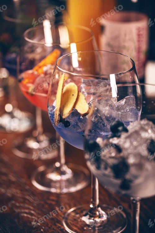 Preview: Elegant gin and tonic cocktails with blueberries
