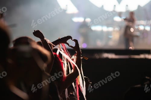 Preview: crowd partying stage lights live concert summer music festival