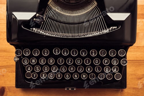 Preview: Vintage typewriter machine on writers desk