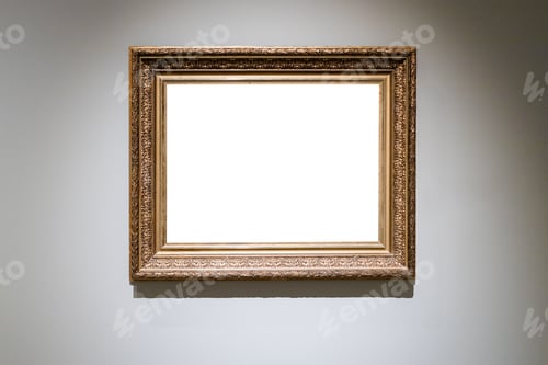 Preview: old carved wide wooden picture frame on gray wall