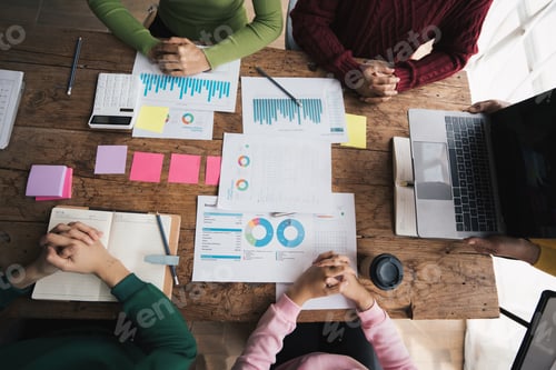 Preview: Business team colleagues meeting Planning Strategy Analysis discussing new plan financial graph data