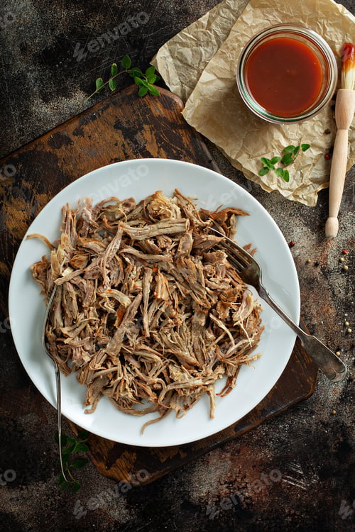 Preview: Pulled pork with forks on a plate