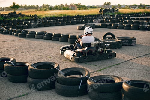 Preview: Handsome man in a karting with a car