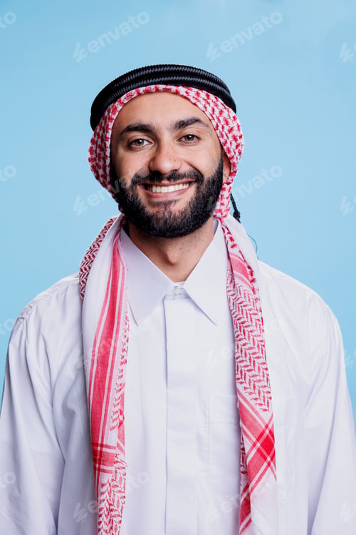 Preview: Cheerful muslim man studio portrait