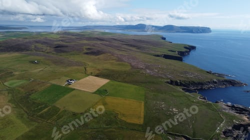 Preview: Aerial view of Orkney Islands coastline and fields