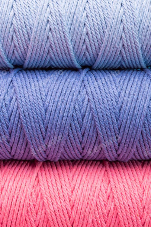 Preview: Stacked cotton yarn in pastel colors, soft hues of blue and pink