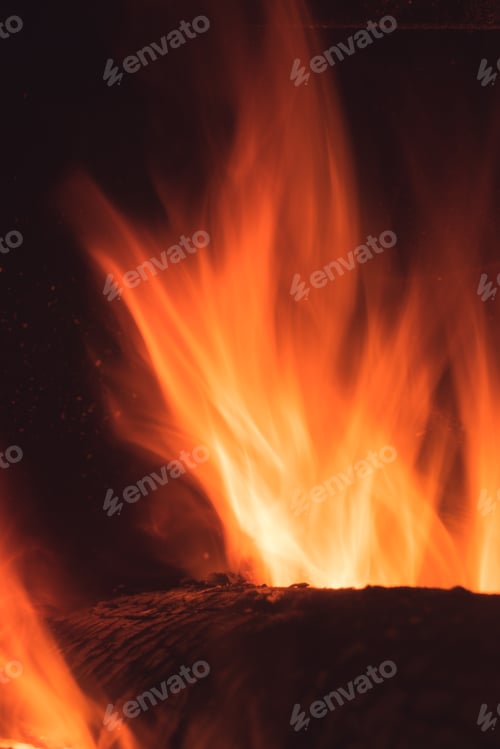 Preview: Log on fire in a home fireplace
