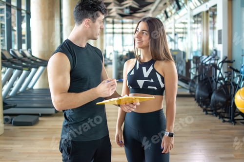 Preview: Personal trainer and client discussing her progress at the gym