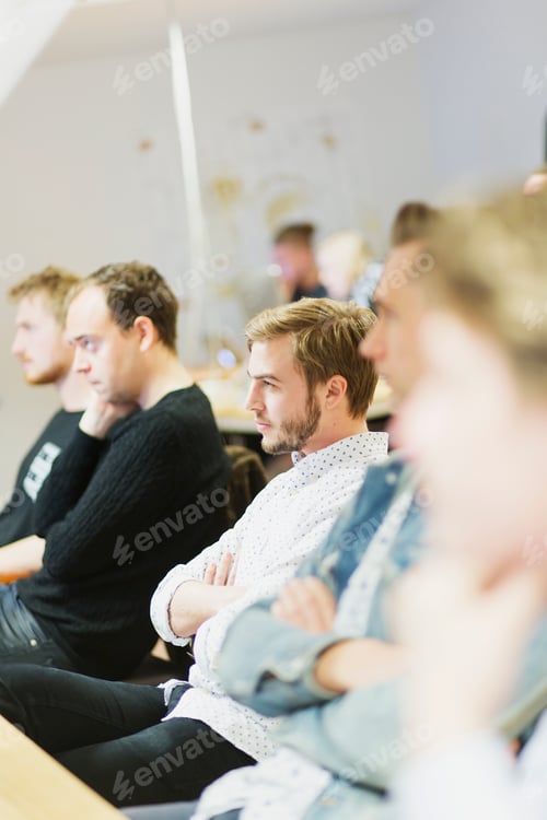 Preview: Male students sitting in media class