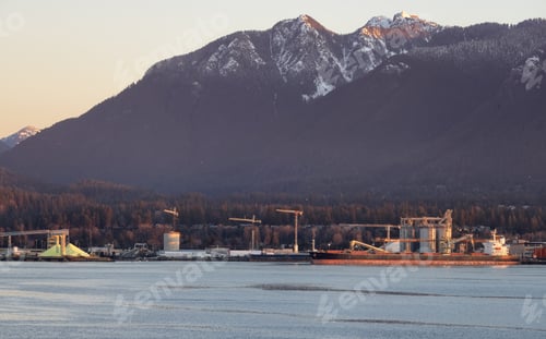Preview: Industrial Sites in Vancouver Harbour with Mountains in Background.