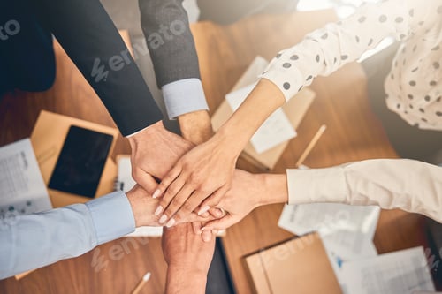 Preview: Business people holding their hands together during meeting
