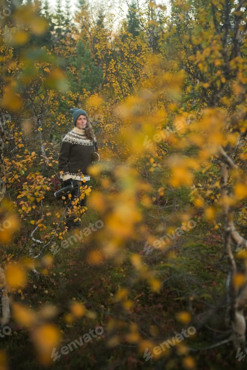 Preview: Standing woman portrait in colourful autumn nature