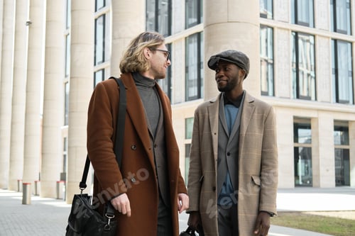 Preview: Two men standing outdoors