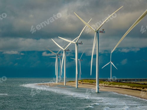 Preview: Wind turbines stretching along the beach in Holland