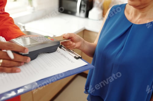 Preview: Woman Paying for Plumbing Service