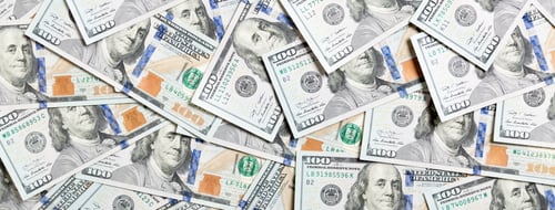 Preview: Top view of one hundred dollar banknotes made as a background. USD currency