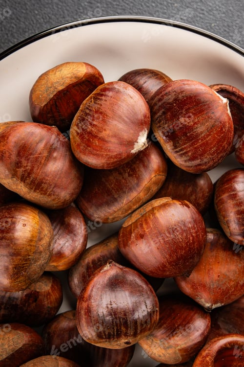Preview: Edible chestnuts delicious treat tasty snack fresh gourmet food background on table rustic food