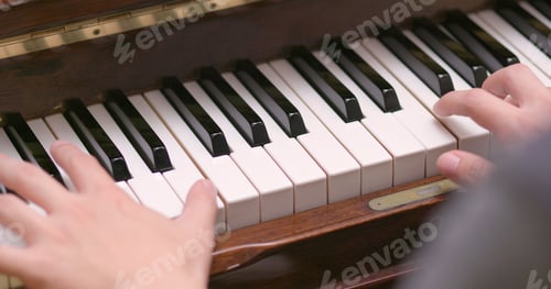 Preview: Man practicing piano