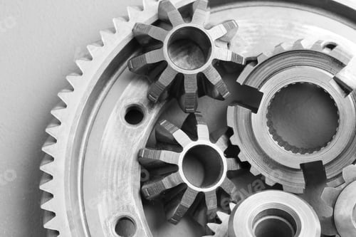 Preview: Different stainless steel gears on light grey background, top view