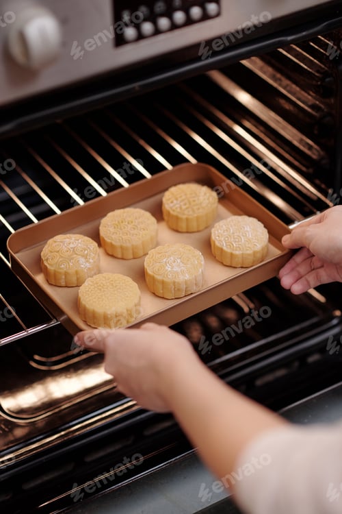 Preview: Woman Baking Mooncakes at Home