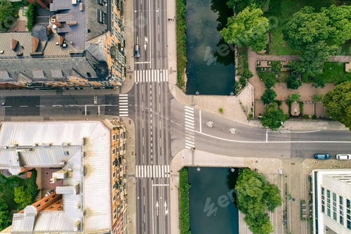Preview: Aerial view of a bustling city intersection with a clear day