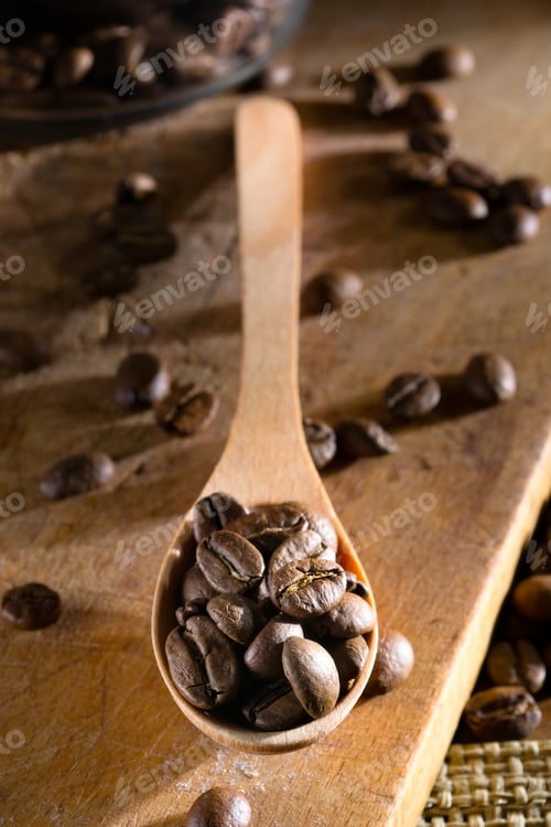 Preview: coffee beans in a wooden spoon