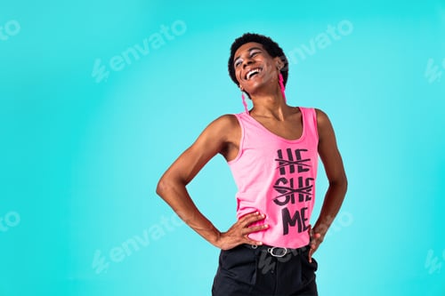 Preview: Fashionable fluid gender man posing in studio
