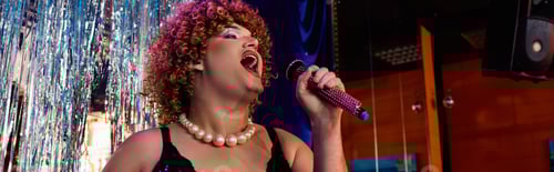 Preview: Eccentric drag queen wows crowd with bold performance at holiday celebration