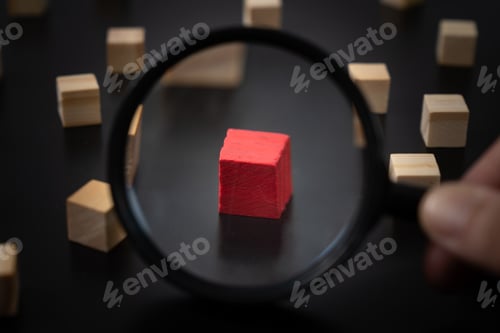 Preview: Magnifying glass to inspect a wood block in still life photography
