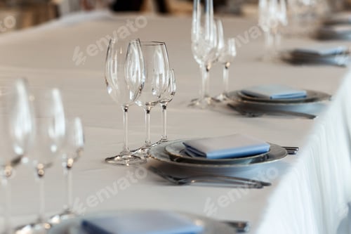 Preview: luxury wedding arrangement of stylish glasses plates on napkins